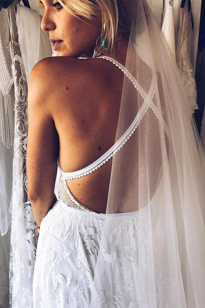 Charming A-line Lace Spaghetti Straps Split Ivory Long Beach Wedding Dress from promnova.com